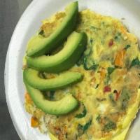 The veggie Omelette · spinach, onion , mushrooms, avocado, red and green pepper served with white or whole wheat b...