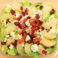 Pear and Gorgonzola Salad · Baramelided bears, Gorgonzola cheese, smoked bacon, dried cranberries over romaine lettuce a...