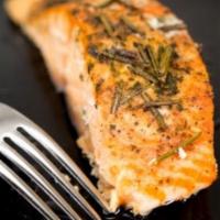 Broiled Filet of Salmon · White wine and butter lemon sauce.