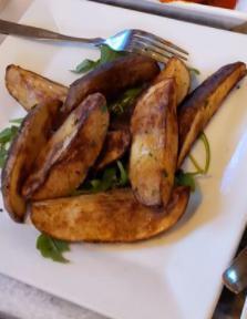 Patate al Forno · Oven roasted potatoes with rosemary.
