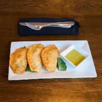 Empanadas · 3 empanadas Choose from beef, chicken or vegetable.
***Temp price inc for meat shortage and ...