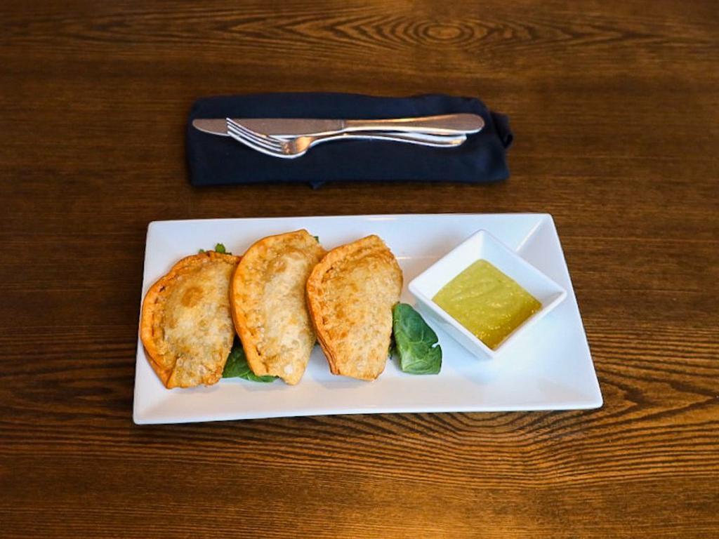 Empanadas · 3 empanadas Choose from beef, chicken or vegetable.
***Temp price inc for meat shortage and protein supply chain interruption***