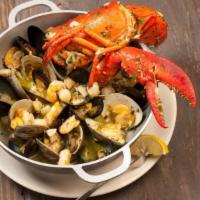 Mariscos Na Cataplana · Clams, mussels, scallops, shrimp, and monk fish simmered in your choice of spicy red or garl...