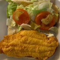 Catfish poboy  · 6 inch bread with 6 inch catfish fillet dress to your choosing