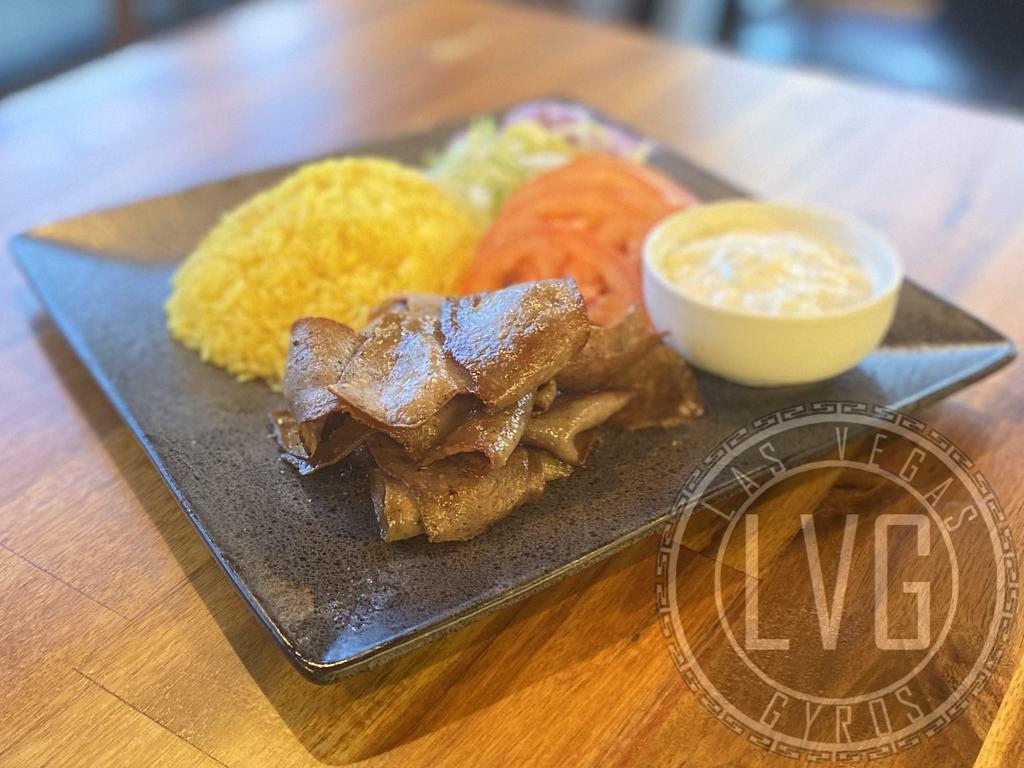 The Classic Gyro Bowl · Beef and lamb slices on saffron rice, tomato, lettuce, onion, and tzatziki