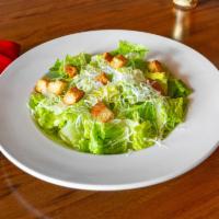  Caesar Salad · Parmesan, croutons, lemon wedge.