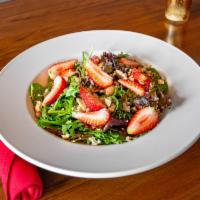 Berry Garden Salad · Mixed greens, fresh berries, almonds, and blue cheese crumbles raspberry vinaigrette.