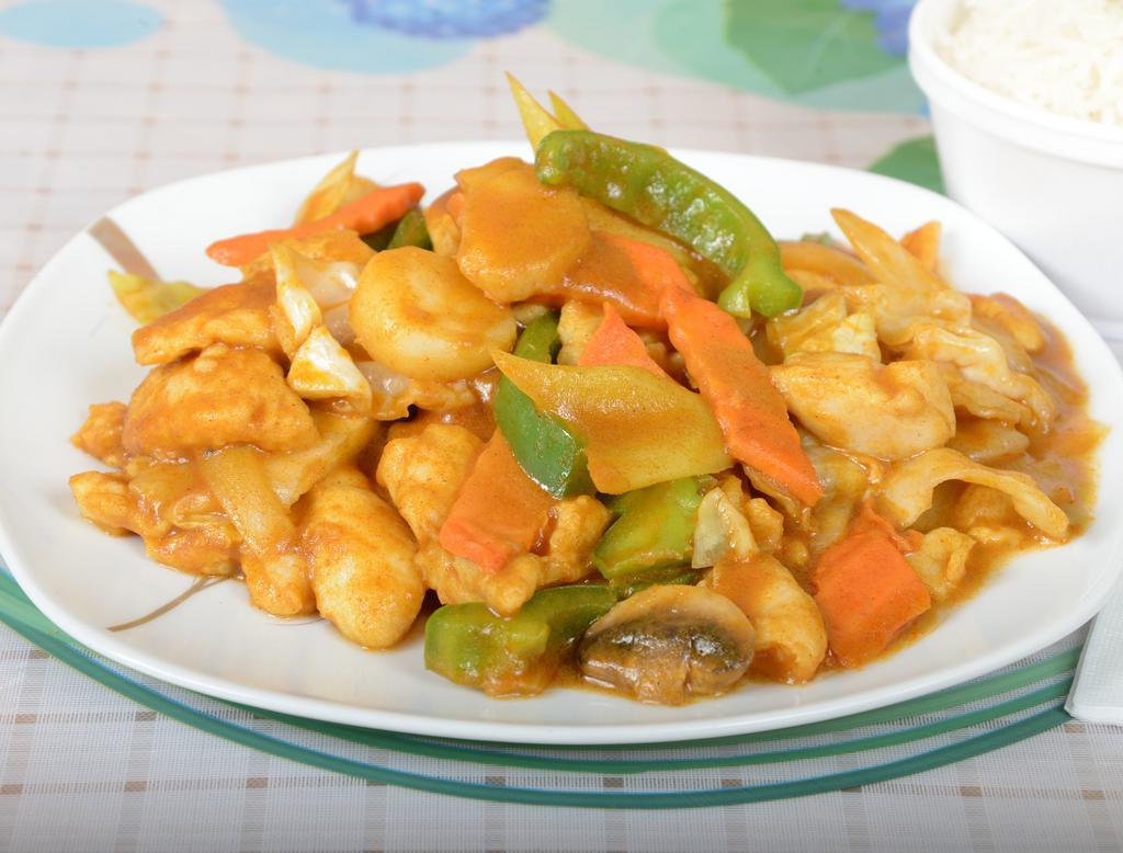 T1. Curry Chicken · Served with white rice.