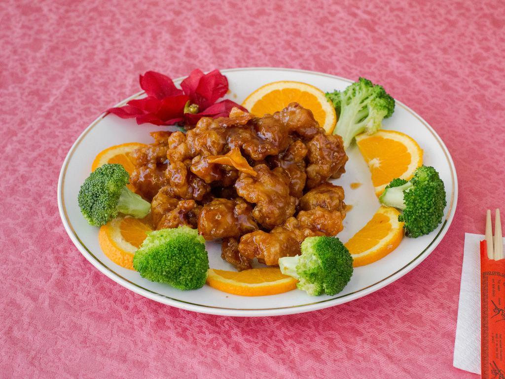 S1. House Special Chicken · Served with orange flavor. Chunks of tender chicken with orange peel in special sauce and mixed vegetable. Served with white rice.