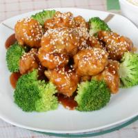 S2. Sesame Chicken · Served with white rice.