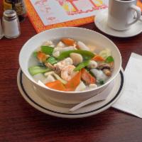 Seafood Combination Udon Soup · Shrimp scallops and calamari mix vegetable with udon noodles.