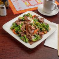 Beef with Broccoli · Sliced beef stir-fried with fresh broccoli in flavorful brown sauce.
