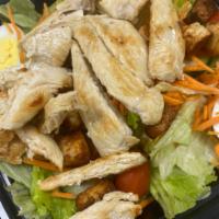 Grilled Chicken Toss Salad · Salad that has been tossed with dressing.