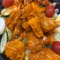 Buffalo Chicken Salad · Salad with chicken that has been cooked in a spicy buttery sauce.