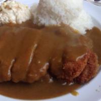 Chicken Cutlet  · Breaded chicken, deep-fried, and covered with brown gravy or curry.