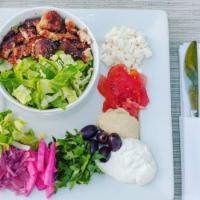 Lettuce Bowl with Chicken Shawarma · halal chicken shawarma on romaine lettuce with your choice of toppings and sauces