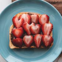 Nutella Toast · Toasted sliced bread with nutella spread and strawberry. 