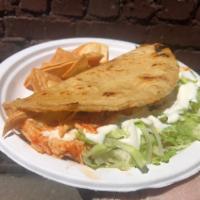 Corn Quesadilla · Choice of meat, cheese, lettuce and sour cream.