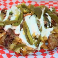 Alambre Fries · Choice of meat, fries, cheese, sour cream, grilled onions, bell peppers, and jalapeños.