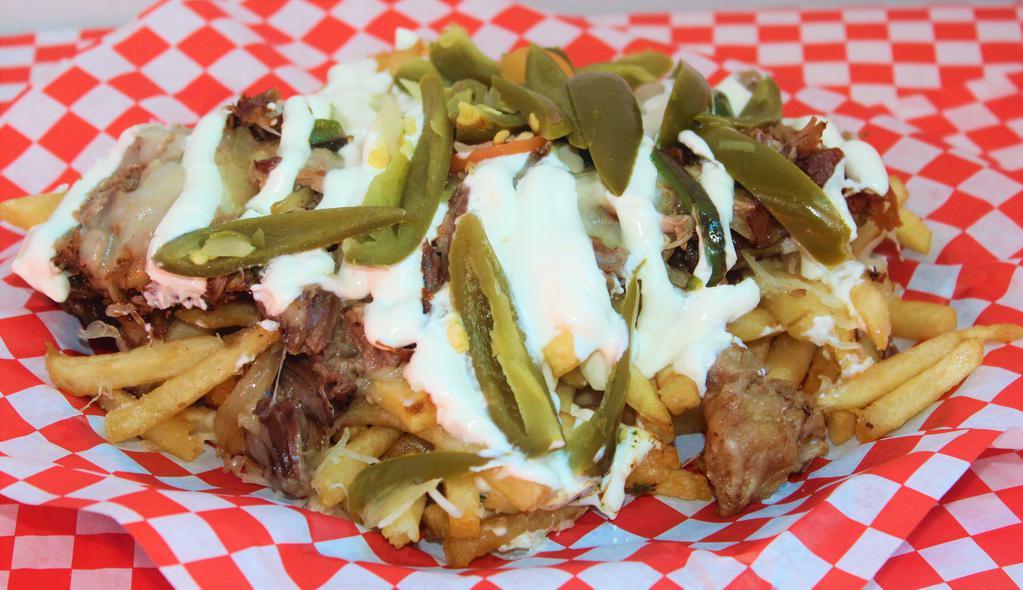 Alambre Fries · Choice of meat, fries, cheese, sour cream, grilled onions, bell peppers, and jalapeños.
