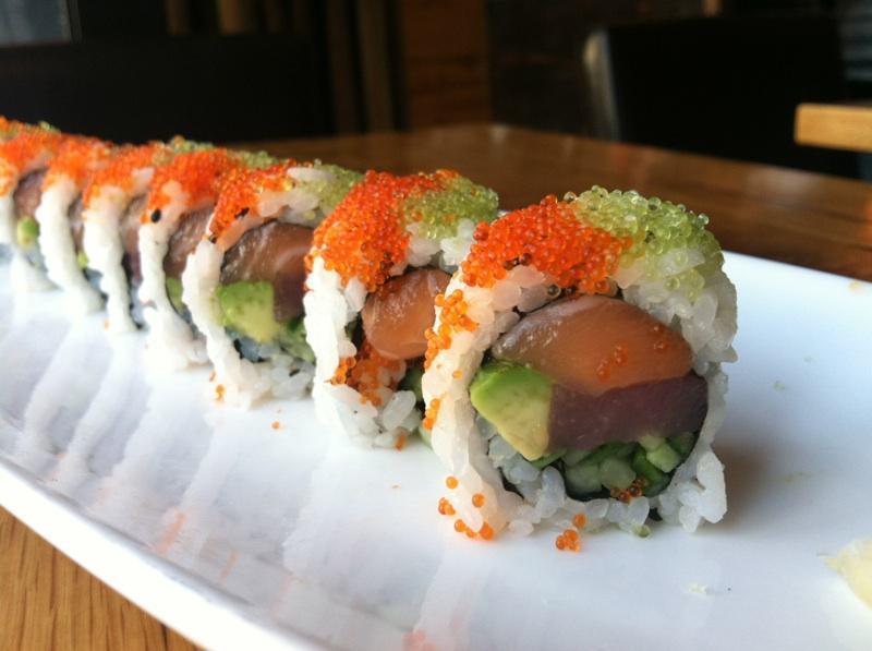 Off-Key Marie · Tuna, Salmon, cucumber, avocado wrapped in nori & rice, toped with orange & wasabi tobiko.