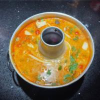 Tom Yum Kung (Authentic Thai) · Shrimp, lime juice, chili jam, galanga, lemongrass, Tomatoes,Mushroom, onion, cilantro and s...