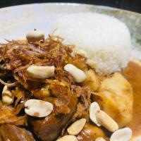 Beef Stew Massaman Curry · Thai massaman curry paste, peanuts, potatoes, chunks of beef, palm sugar, coconut milk, frie...