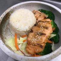 Grilled Miso Salmon Rice Bowl · Miso-marinated grilled salmon served with white rice, Broccoli, Carrot, Cabbage, Teriyaki sa...