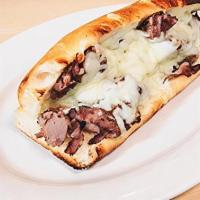 Chicago Beef (16 Inch) · A select cut of hand sliced roast beef dipped in au jus and topped with mozzarella cheese.