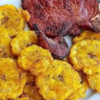 Fried Pork Chops · Chuleta frita con guarnición a elegir.