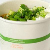 Miso Broccoli Bowl · Miso Broccoli Soup / Topped with: riced cauliflower, black beans, green onion, broccoli, cau...