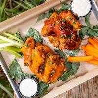 Chicken Wings · 12 pcs Buffalo or BBQ with Blue Cheese, Carrots ＆ Celery