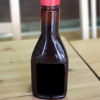 Top Hat's Backdoor BBQ Sauce  · Our signature original sauce. 12 FL OZ Squeezable bottle.