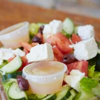 Greek Salad · Romaine lettuce, tomato, cucumber, feta cheese and black olives.