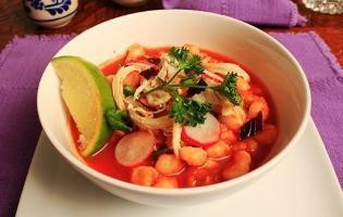 Pozole Rojo · Gluten free. Red salsa soup with white corn. Another version of Pozole, this one is made with guajillo sauce, lean shredded pork and chicken breast, and white corn. Delicious by itself or when served with fresh lime juice provided, dry oregano leaves and tostadas.