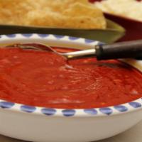 Salsa Roja · Vegan. Gluten free. Red salsa. This is a smooth cooked salsa that is generally mild and is d...
