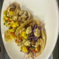 Cauliflower Tacos · 3 tacos with roasted cauliflower, mango salsa, avocado, cabbage, with your choice of corn or...