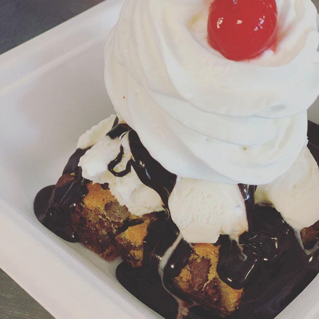 Regular Sundae · 2 scoop. All sundae's include your choice of any hot topping plus whipped cream, nuts and a cherry.