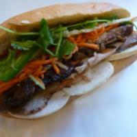 3. Super Combo Sandwich · Chicken, roast pork, fancy pork, marinated carrots and daikons, cilantro, cucumber, jalapeno...