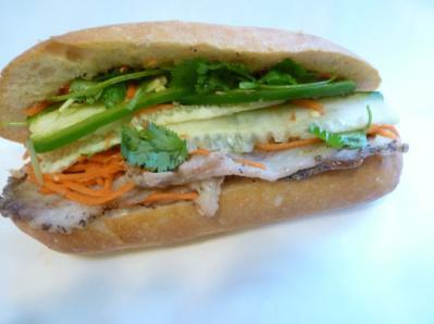 5. Roast Pork Sandwich · Roast pork, marinated carrots and daikons, cilantro, cucumber, jalapenos in hot french baguette.