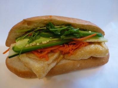 9. Tofu Sandwich · Fried tofu, marinated carrots and daikons, cilantro, cucumber, jalapenos in hot french baguette.
