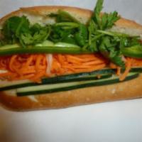 10. Vegetable Sandwich · Marinated carrots and daikons, cilantro, cucumber, jalapenos in hot french baguette.