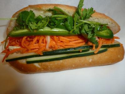 10. Vegetable Sandwich · Marinated carrots and daikons, cilantro, cucumber, jalapenos in hot french baguette.