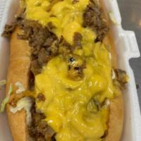 Cheesesteak Combo · Provolone cheese, grilled onions, lettuce, tomatoes and mayo. Served with a regular fry and ...