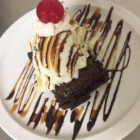 Brownie Sundae · Top off a brownie with two of your favorite ice cream flavors, your choice of wet topping, c...