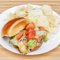 Deluxe Chicken Sandwich · Tender, marinated chicken grilled to perfection and topped with lettuce, tomato and your cho...