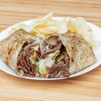 Lamb Gyro Wrap · Tender lamb topped with lettuce, tomato, onion and cucumber sauce. Chips included.
