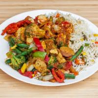 Chicken Curry · Tender, marinated chicken. Chopped and sauteed with onion, jalapeño and tomato. Simmered in ...