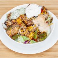 The Cave Salad · Your choice of lamb, chicken or beef served over crisp lettuce, tomato, onion, green peppers...