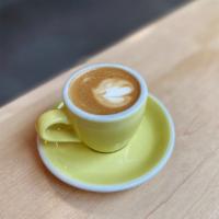Macchiato · 2 oz. espresso, 1 oz. steamed milk or non-dairy milk 